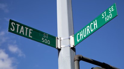 A street sign marked the intersection of "State" and "Church" streets.