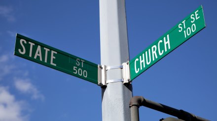 A street sign marked the intersection of "State" and "Church" streets.